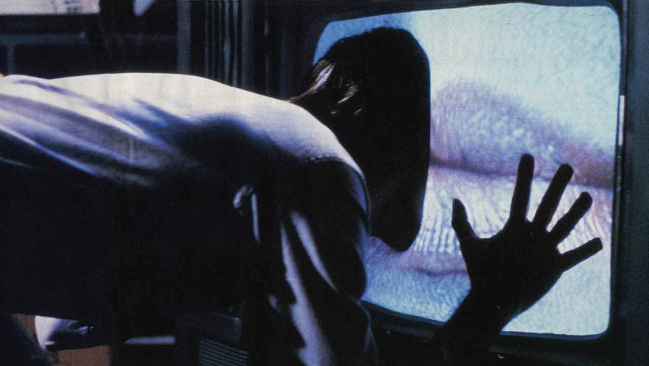 This is a still from the film Videodrome.