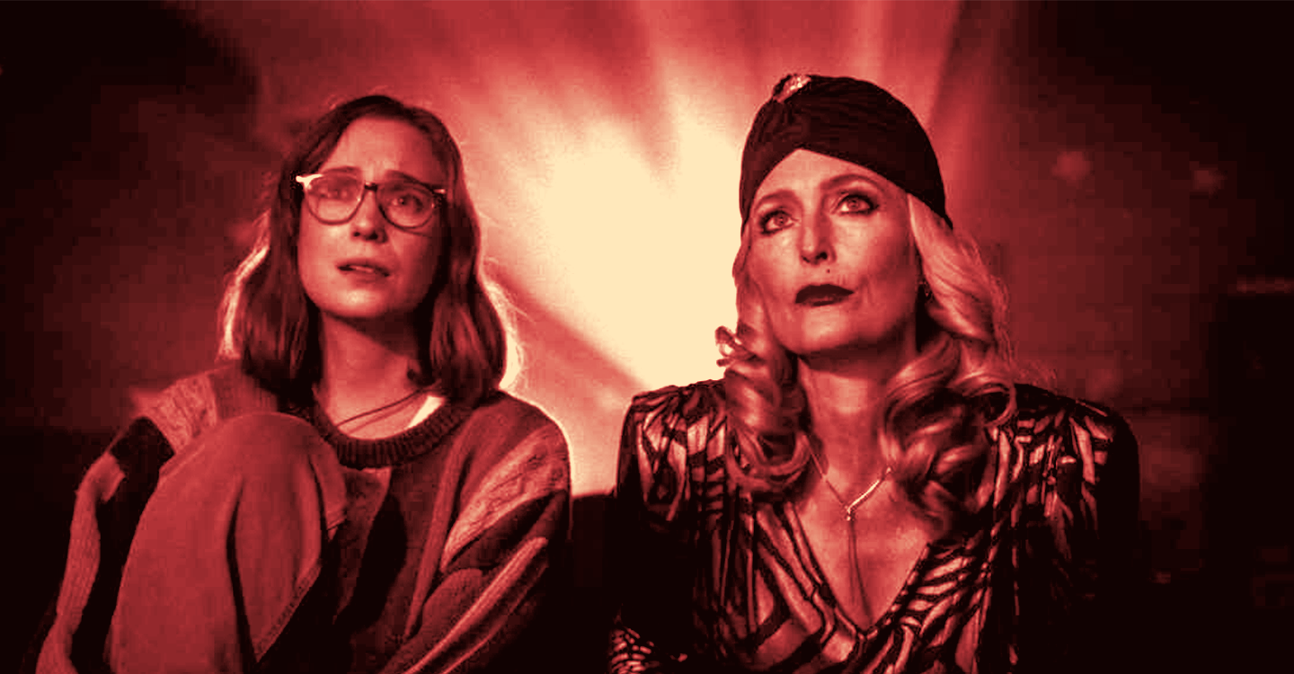 Hannah Einbinder and Gillian Anderson watch a film in 